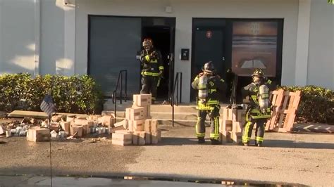 Firefighters combat warehouse fire in Davie